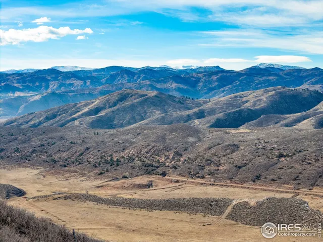 a view of ocean and mountain