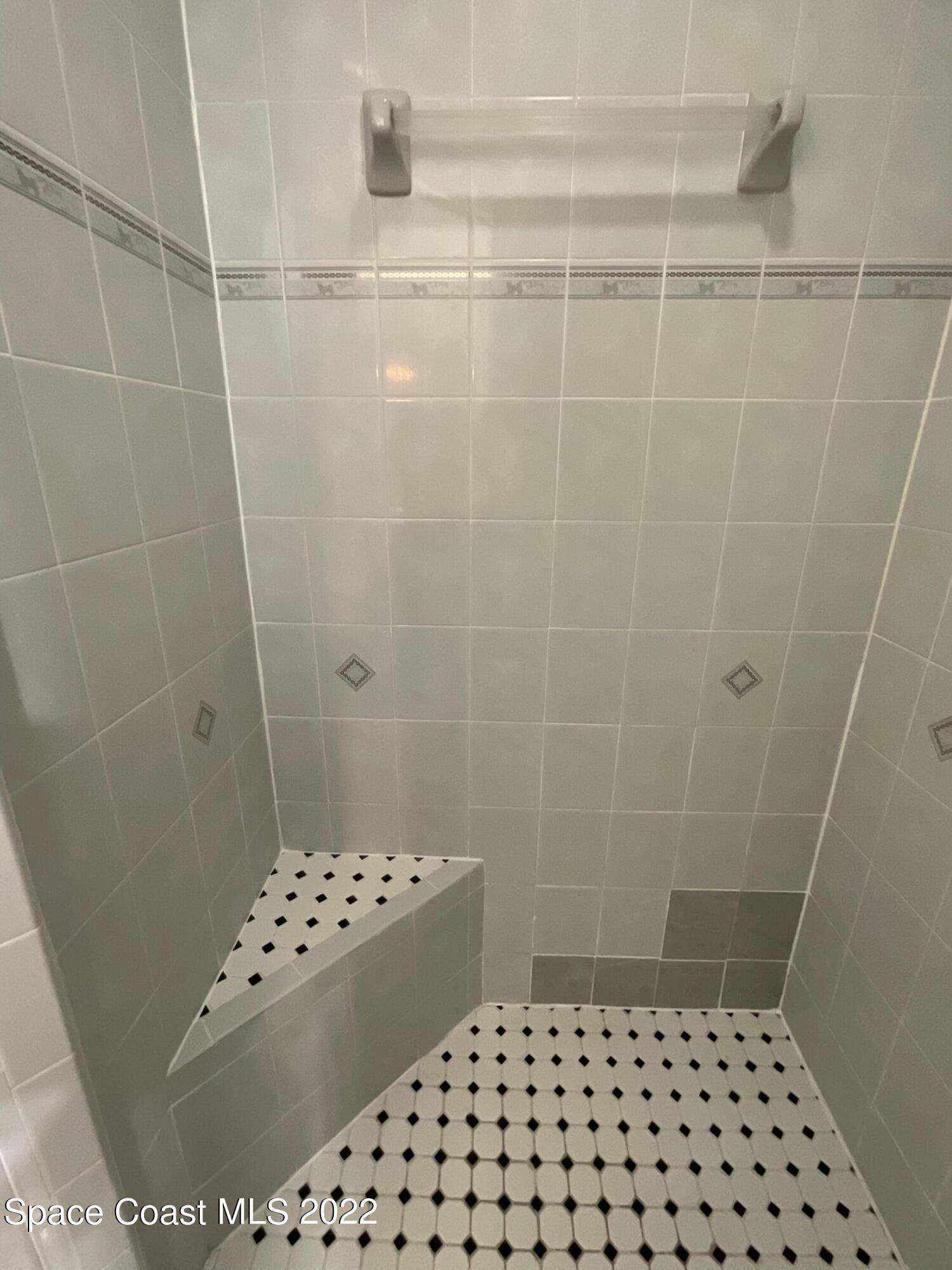 4844 Bridge Road Cocoa, FL 32927 - Photo 19 of 22 a bathroom with a glass door shower