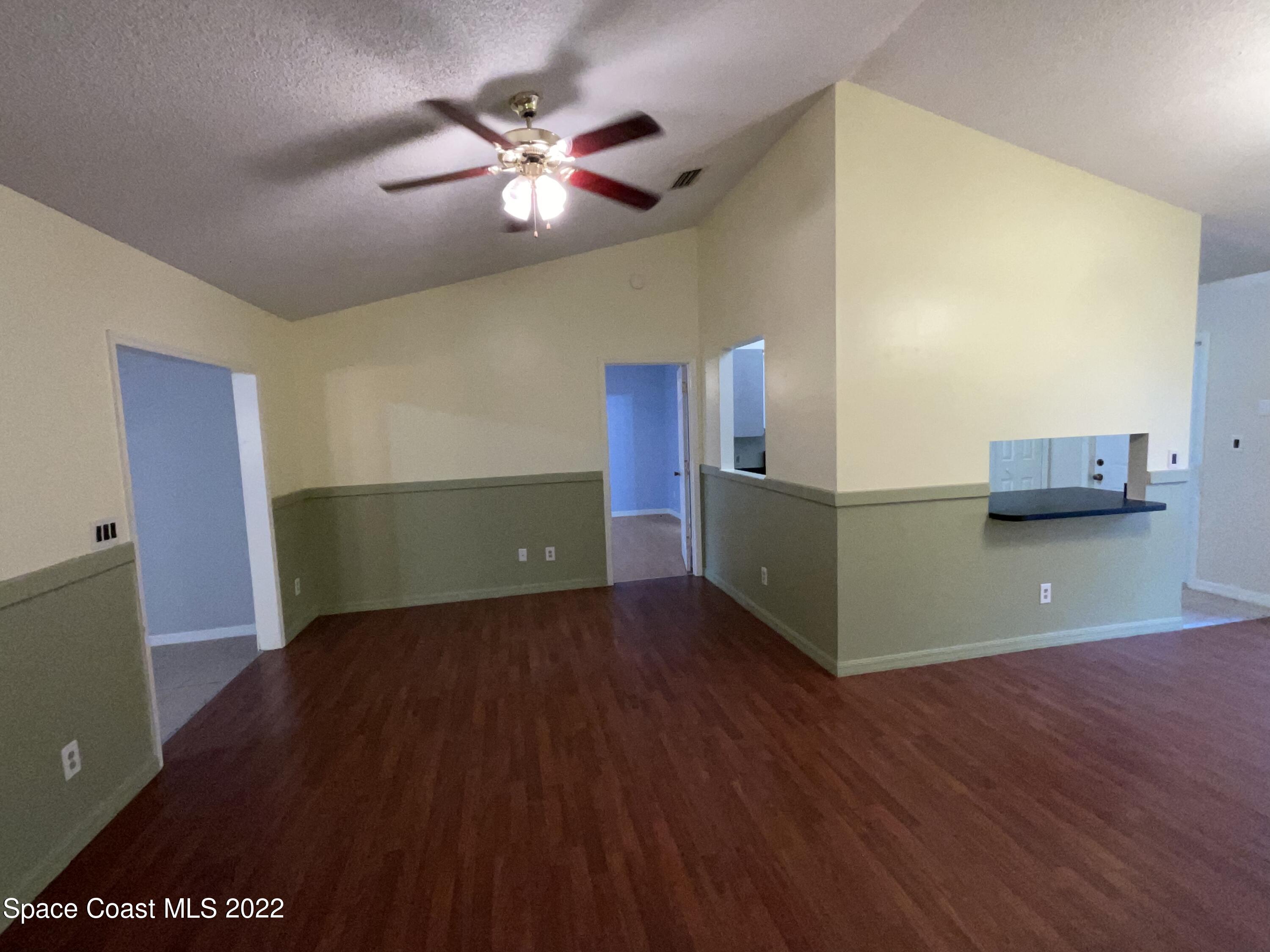 4844 Bridge Road Cocoa, FL 32927 - Photo 21 of 22 a view of a room with wooden floor