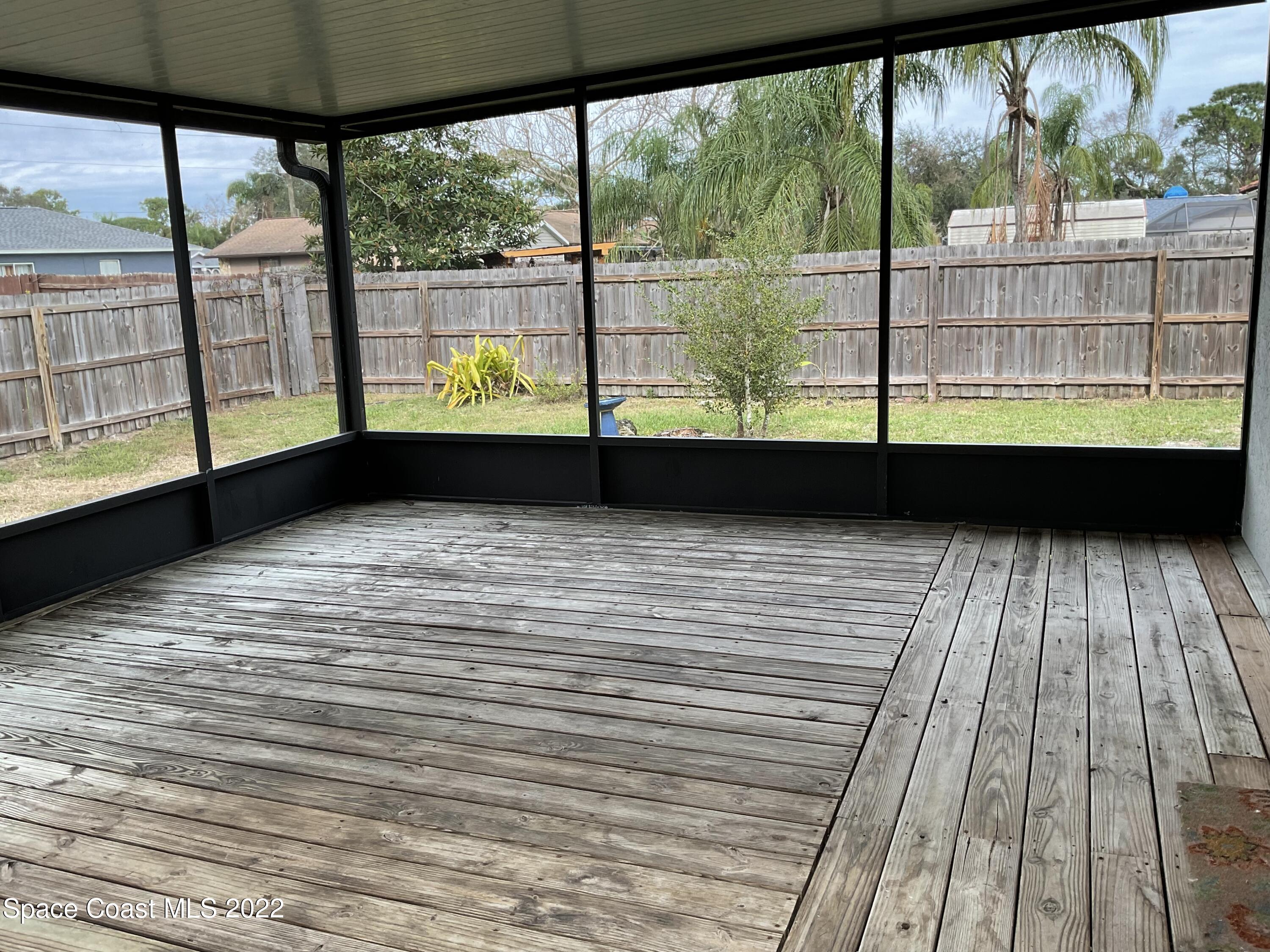 4844 Bridge Road Cocoa, FL 32927 - Photo 3 of 22 a view of a balcony with an outdoor space