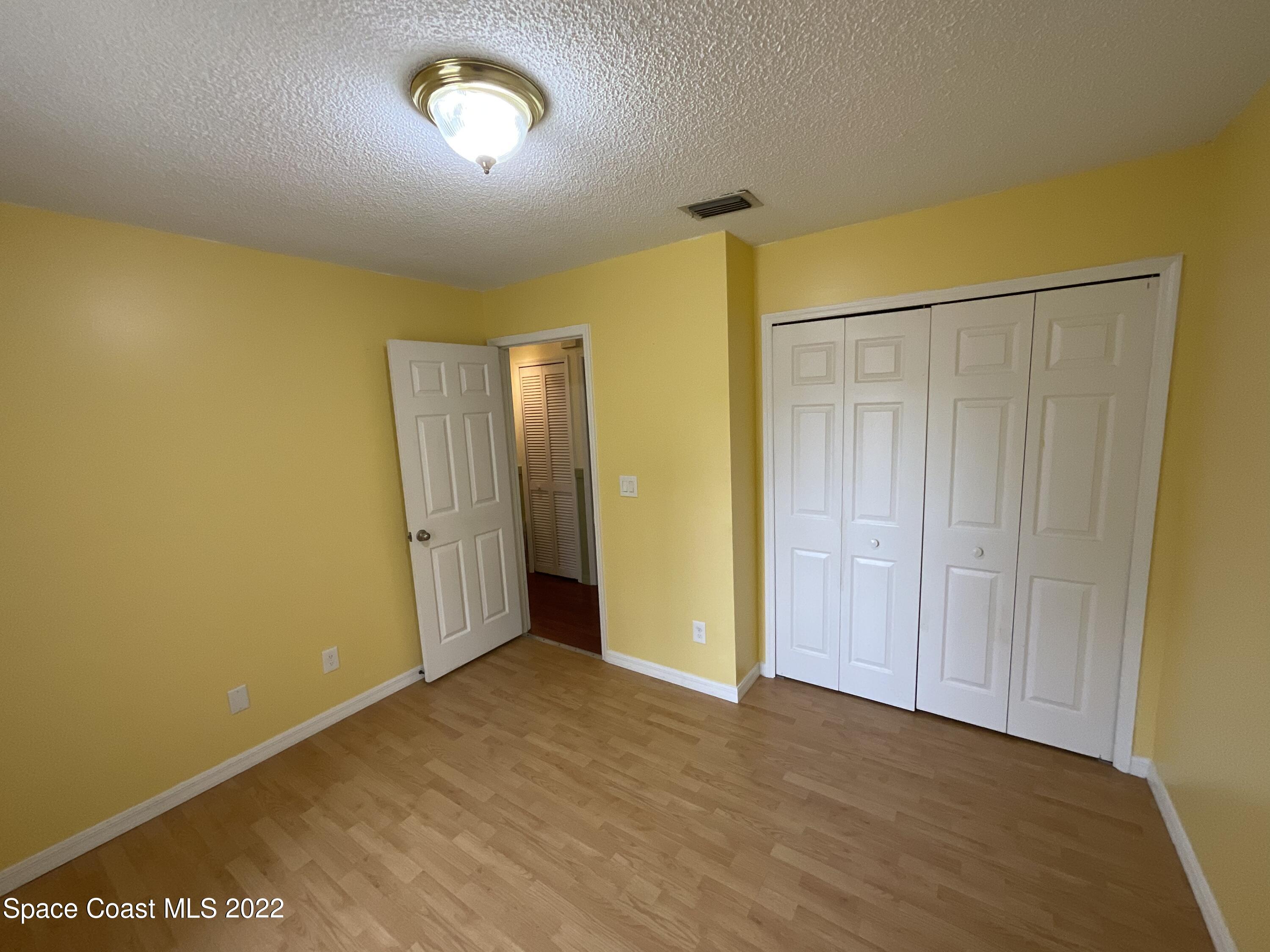 4844 Bridge Road Cocoa, FL 32927 - Photo 5 of 22 a view of an empty room with a window