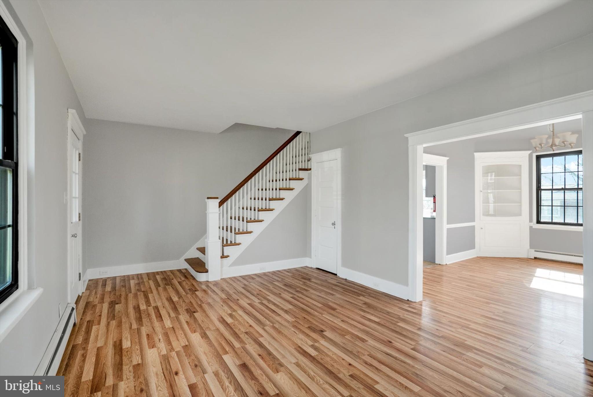 315 Sunset Road Reading, PA 19611 - Photo 4 of 20 wooden floor in an empty room with a window