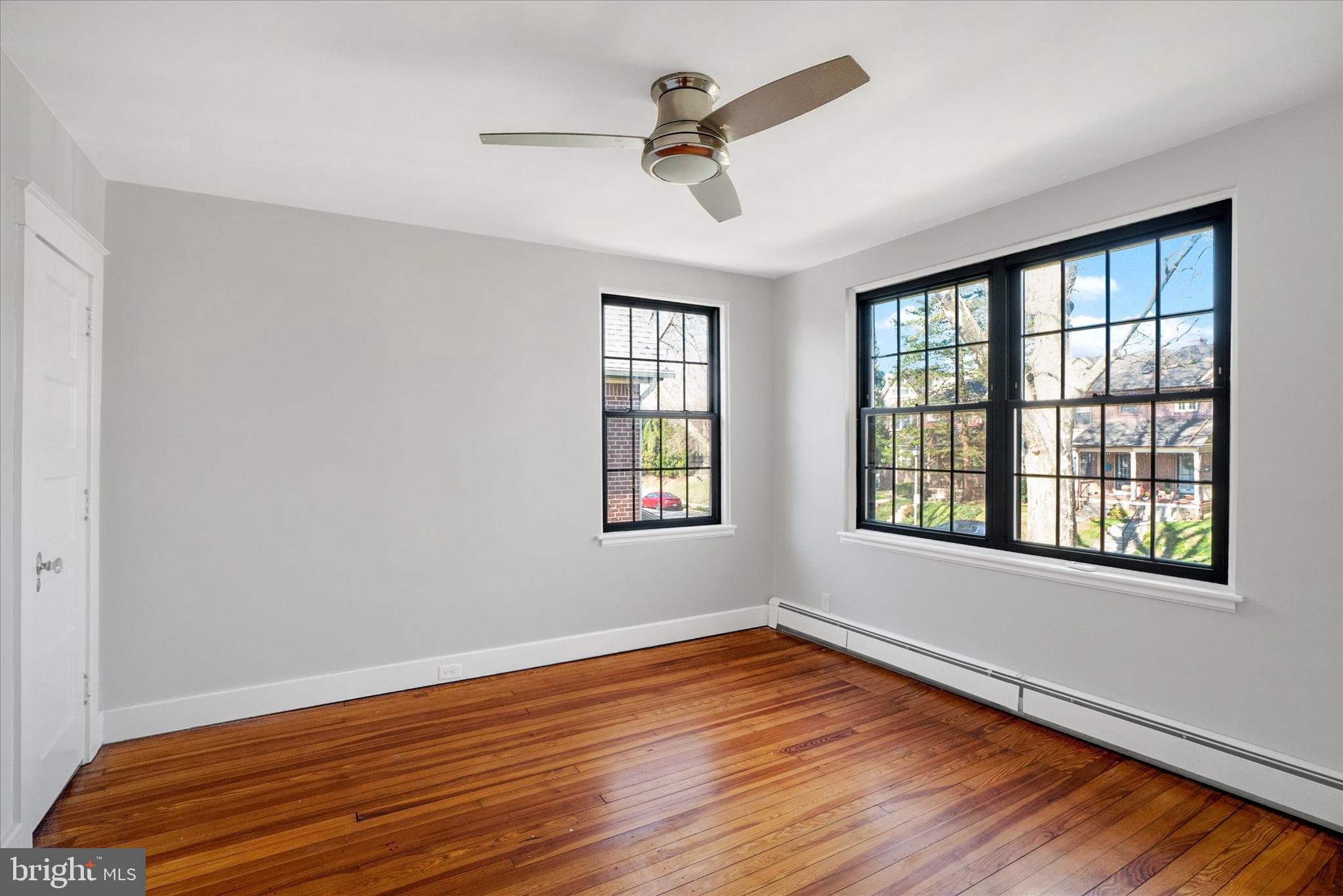 315 Sunset Road Reading, PA 19611 - Photo 10 of 20 a view of an empty room with wooden floor and a window