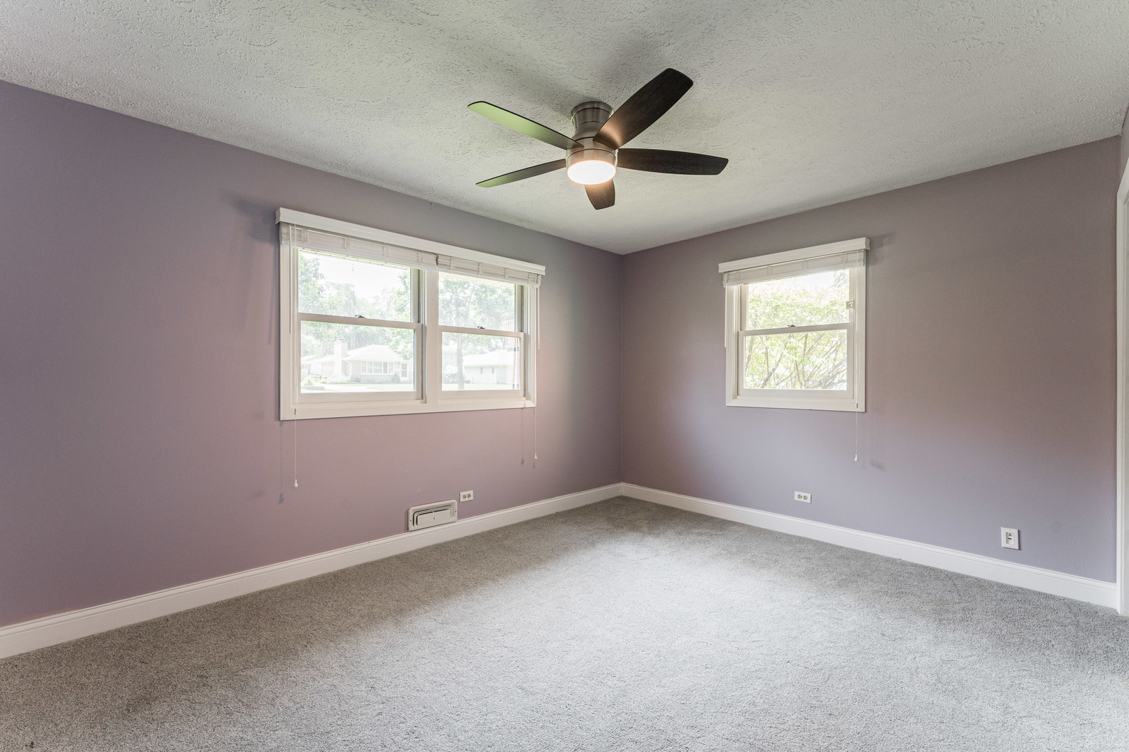 239 Nordic Road Bloomingdale, IL 60108 - Photo 12 of 40 an empty room with a window and a fan
