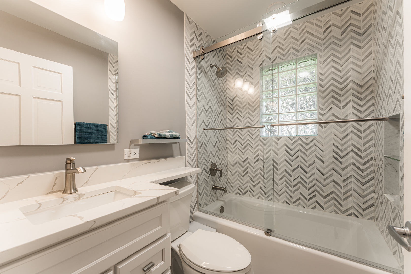 239 Nordic Road Bloomingdale, IL 60108 - Photo 18 of 40 a bathroom with a sink toilet and shower