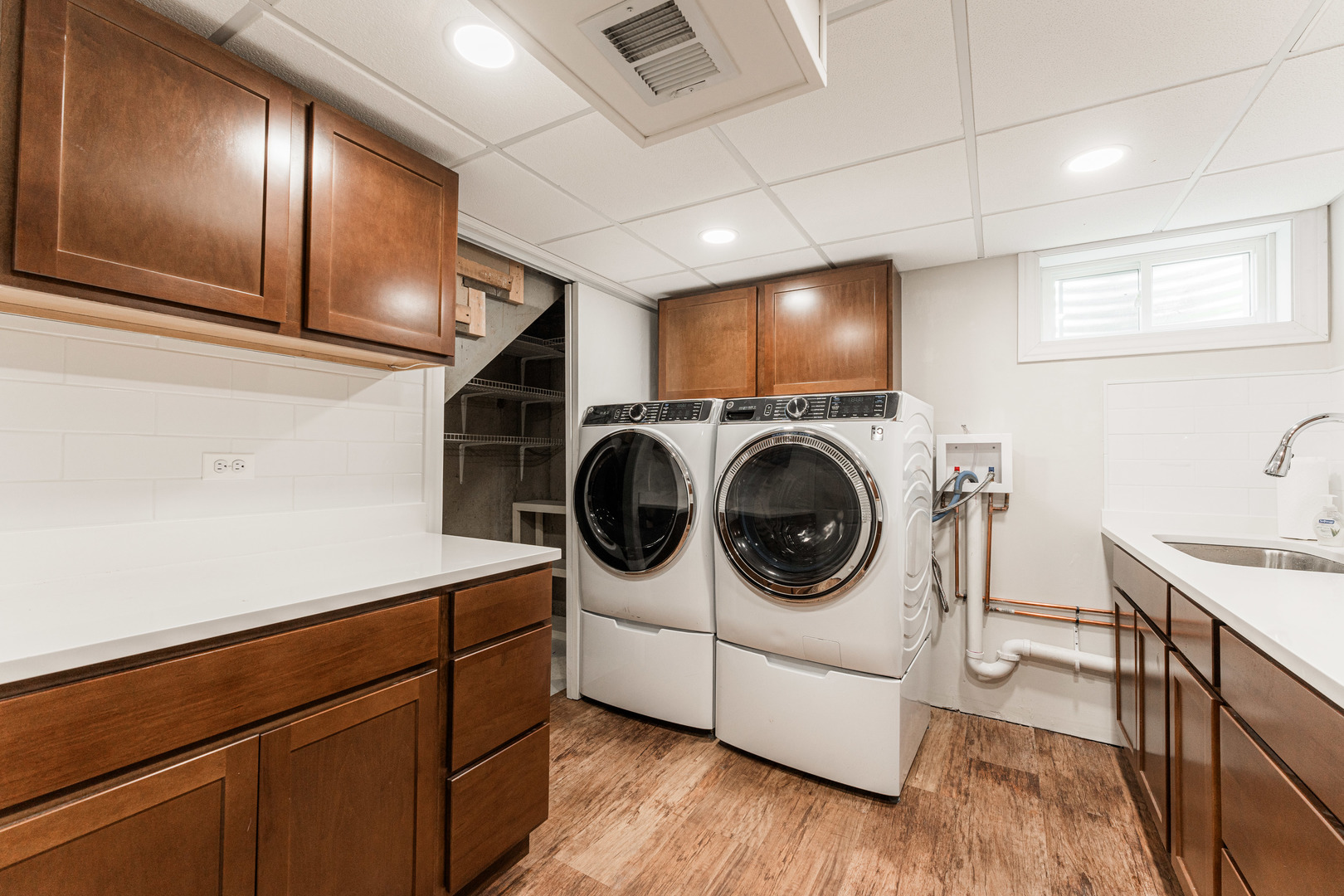 239 Nordic Road Bloomingdale, IL 60108 - Photo 24 of 40 a utility room with sink dryer and washer
