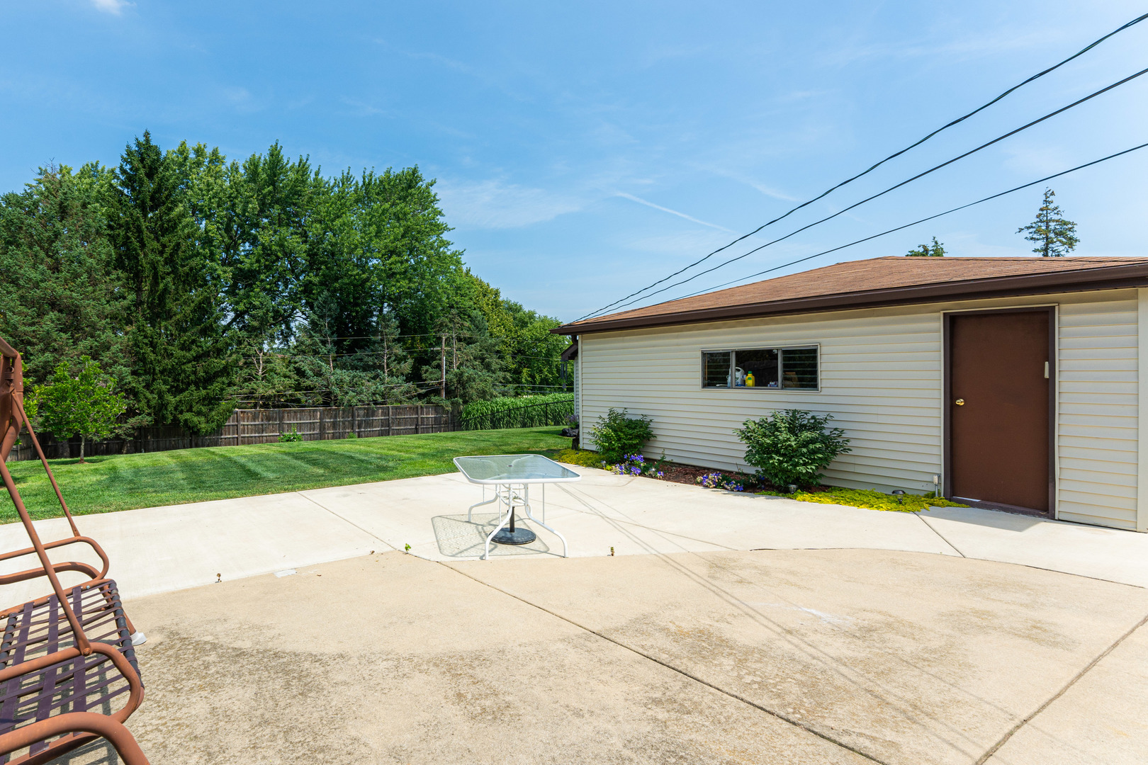 239 Nordic Road Bloomingdale, IL 60108 - Photo 27 of 40 a backyard of a house with yard and outdoor seating