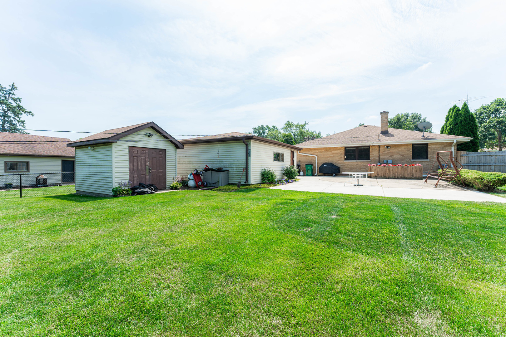 239 Nordic Road Bloomingdale, IL 60108 - Photo 29 of 40 a front view of house with yard barbeque and outdoor seating