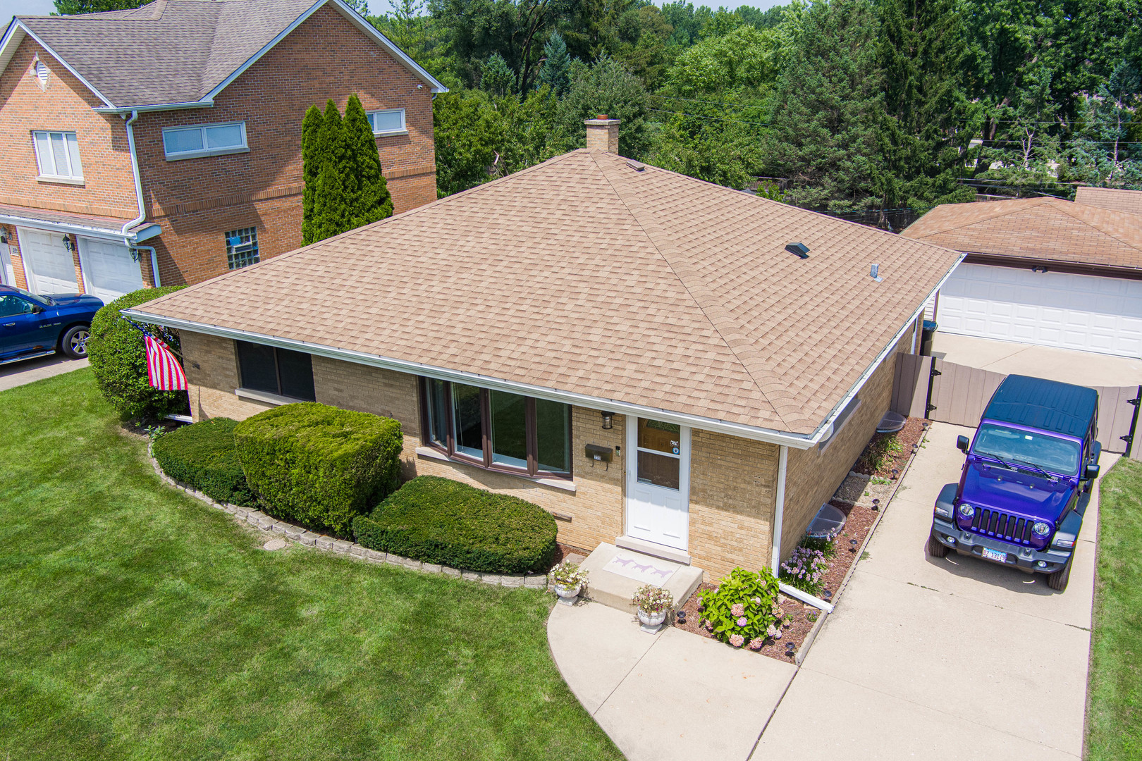 239 Nordic Road Bloomingdale, IL 60108 - Photo 3 of 40 a aerial view of a house with a yard and potted plants