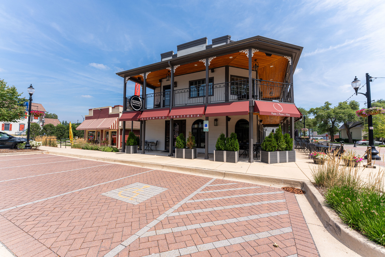 239 Nordic Road Bloomingdale, IL 60108 - Photo 35 of 40 a man walking down a street next to a building