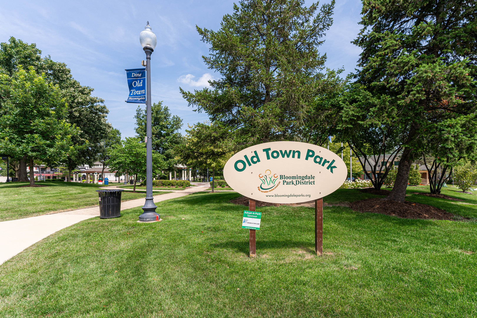 239 Nordic Road Bloomingdale, IL 60108 - Photo 37 of 40 a view of a park with a bench and trees