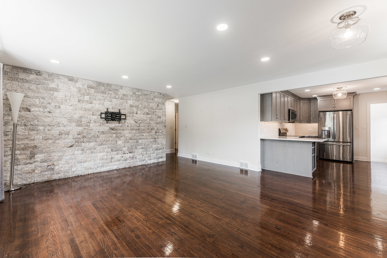 239 Nordic Road Bloomingdale, IL 60108 - Photo 5 of 40 a view of kitchen with wooden floor and electronic appliances