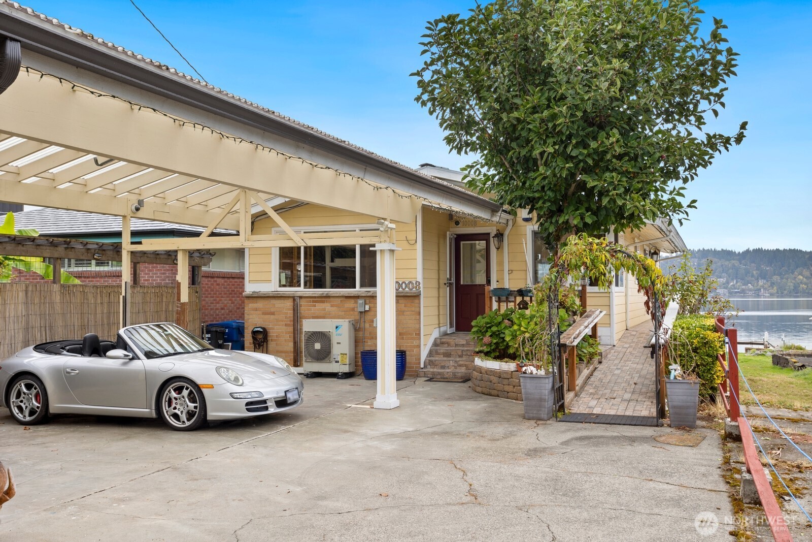 10008 Rainier Avenue South Seattle, WA 98178 - Photo 15 of 40 a view of a car park in front of house