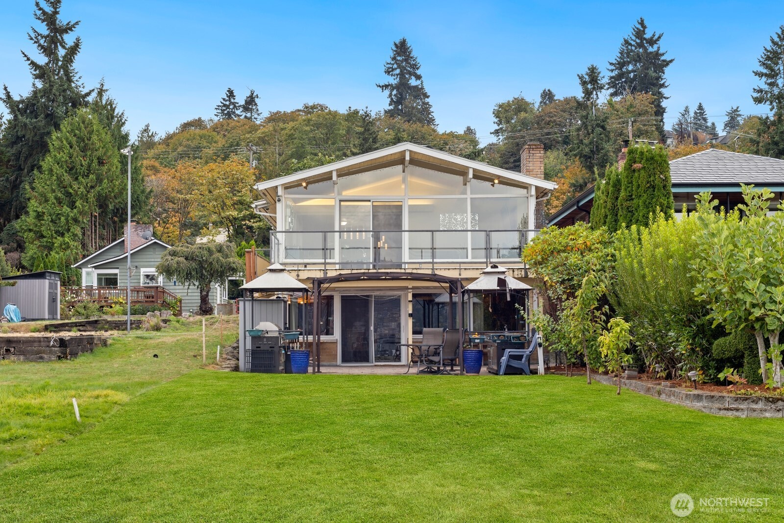 10008 Rainier Avenue South Seattle, WA 98178 - Photo 16 of 40 a view of a house with a yard