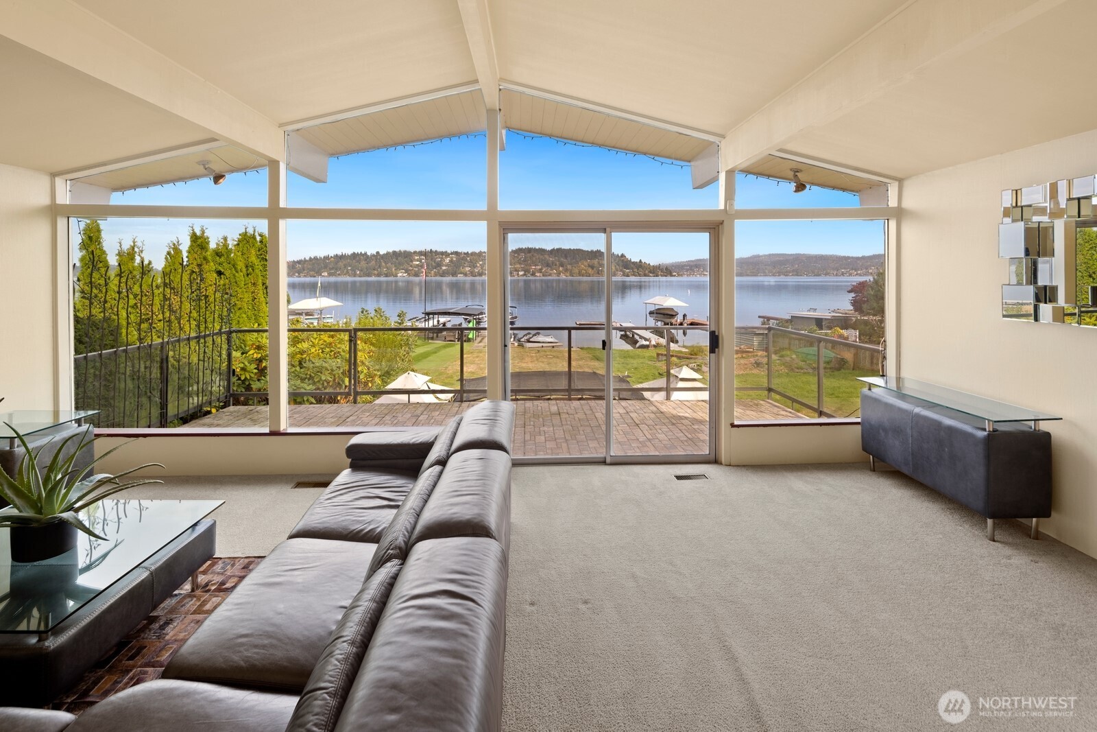 10008 Rainier Avenue South Seattle, WA 98178 - Photo 18 of 40 a living room with furniture and large windows