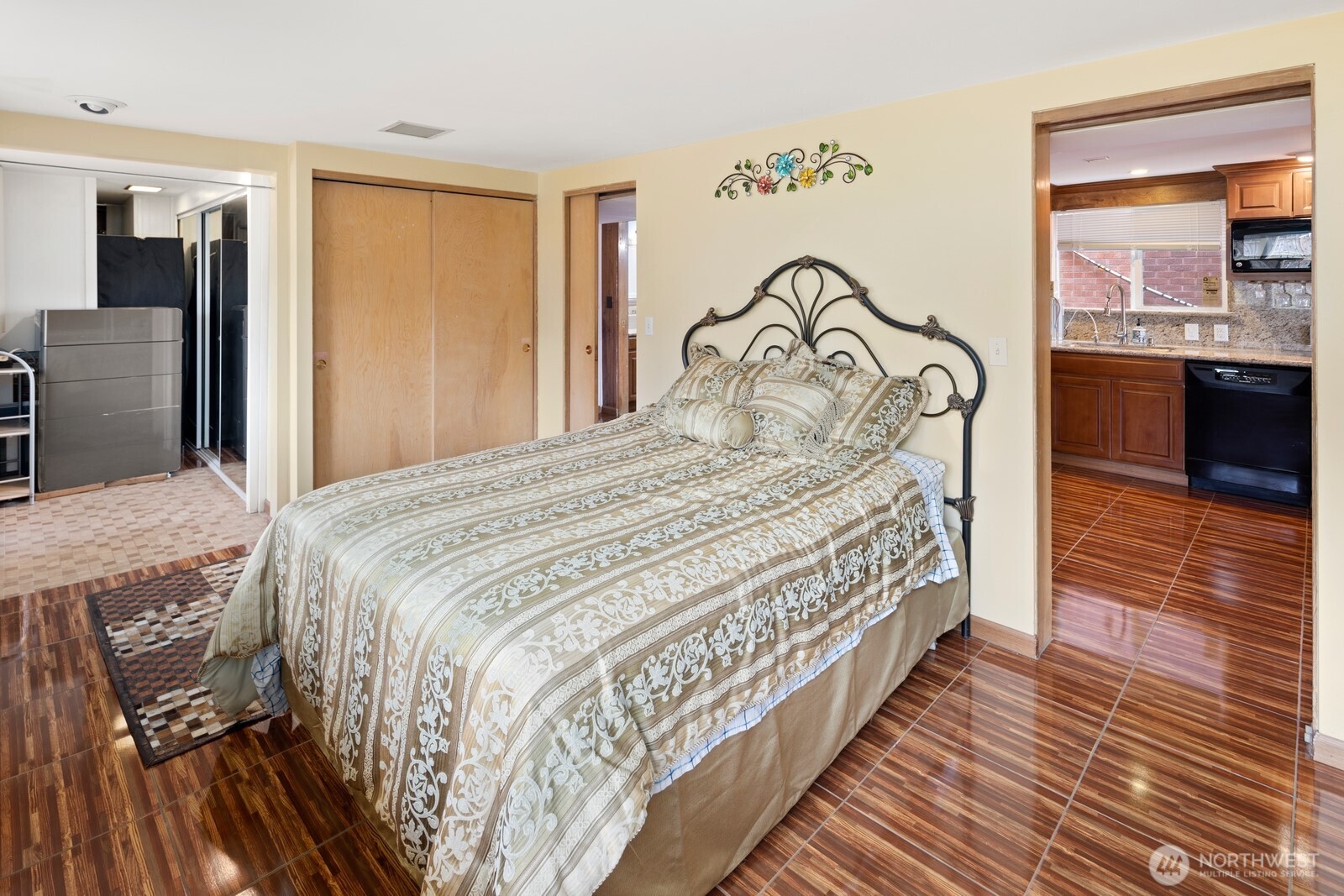 10008 Rainier Avenue South Seattle, WA 98178 - Photo 28 of 40 a bedroom with a bed and a table