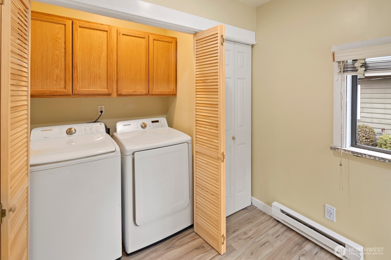 10008 Rainier Avenue South Seattle, WA 98178 - Photo 35 of 40 a utility room with dryer and washer