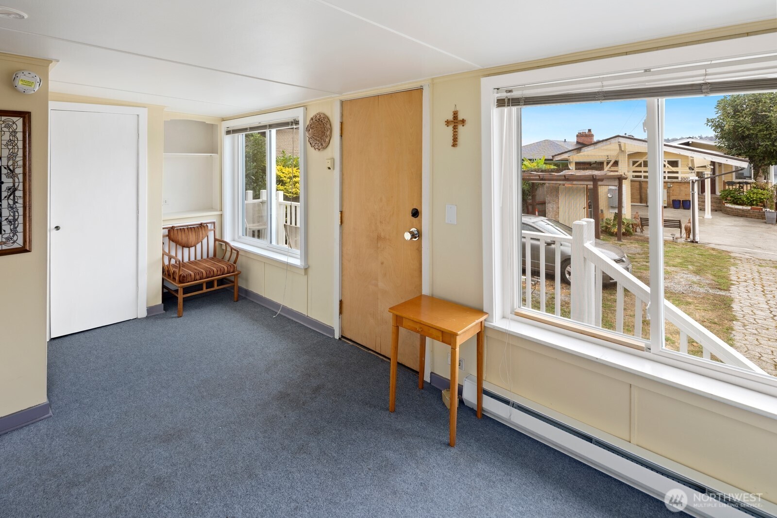 10008 Rainier Avenue South Seattle, WA 98178 - Photo 39 of 40 a living room with a balcony furniture and a window