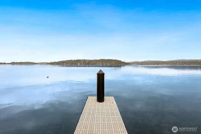 a view of a lake with a garden and lake view