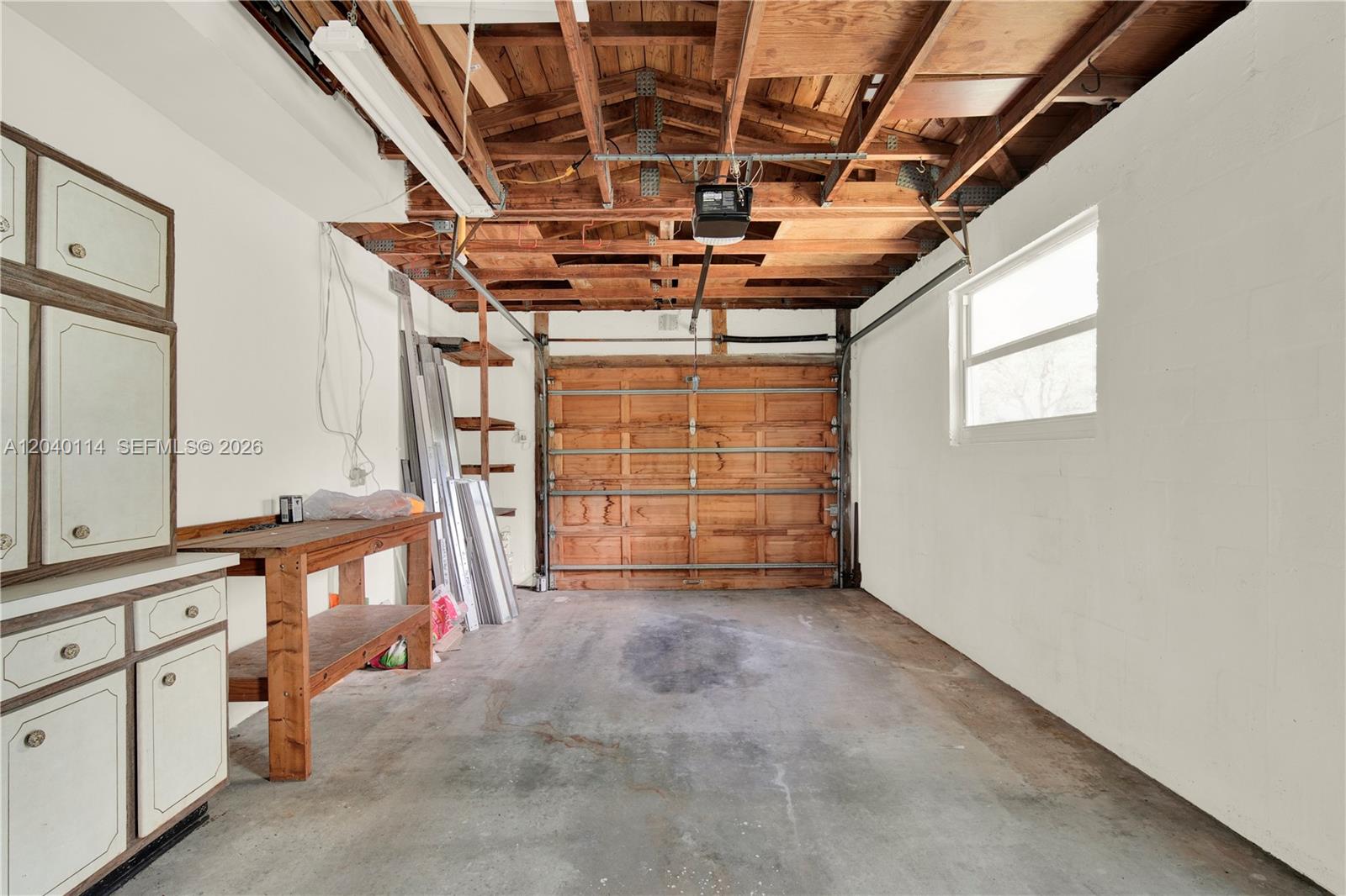 10435 Southwest 96th Street Miami, FL 33176 - Photo 27 of 44 Spacious garage with hurricane braced wood door * 12.6' x 24'