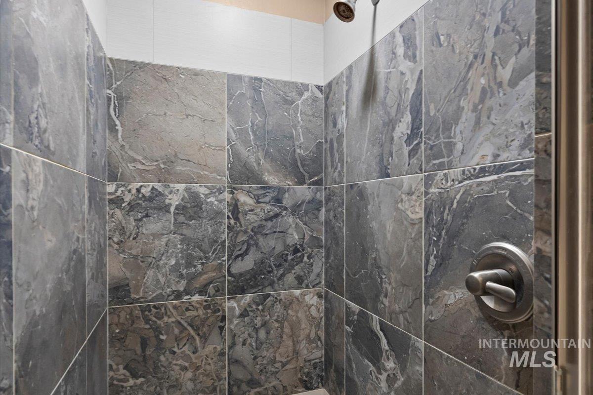 13557 Signorello Street Caldwell, ID 83607 - Photo 21 of 30 Bathroom view of tiled shower
