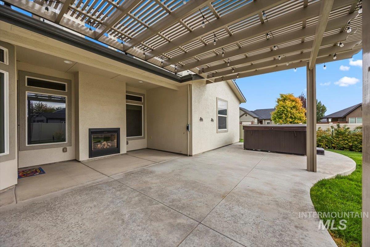 13557 Signorello Street Caldwell, ID 83607 - Photo 26 of 30 View of patio with a pergola