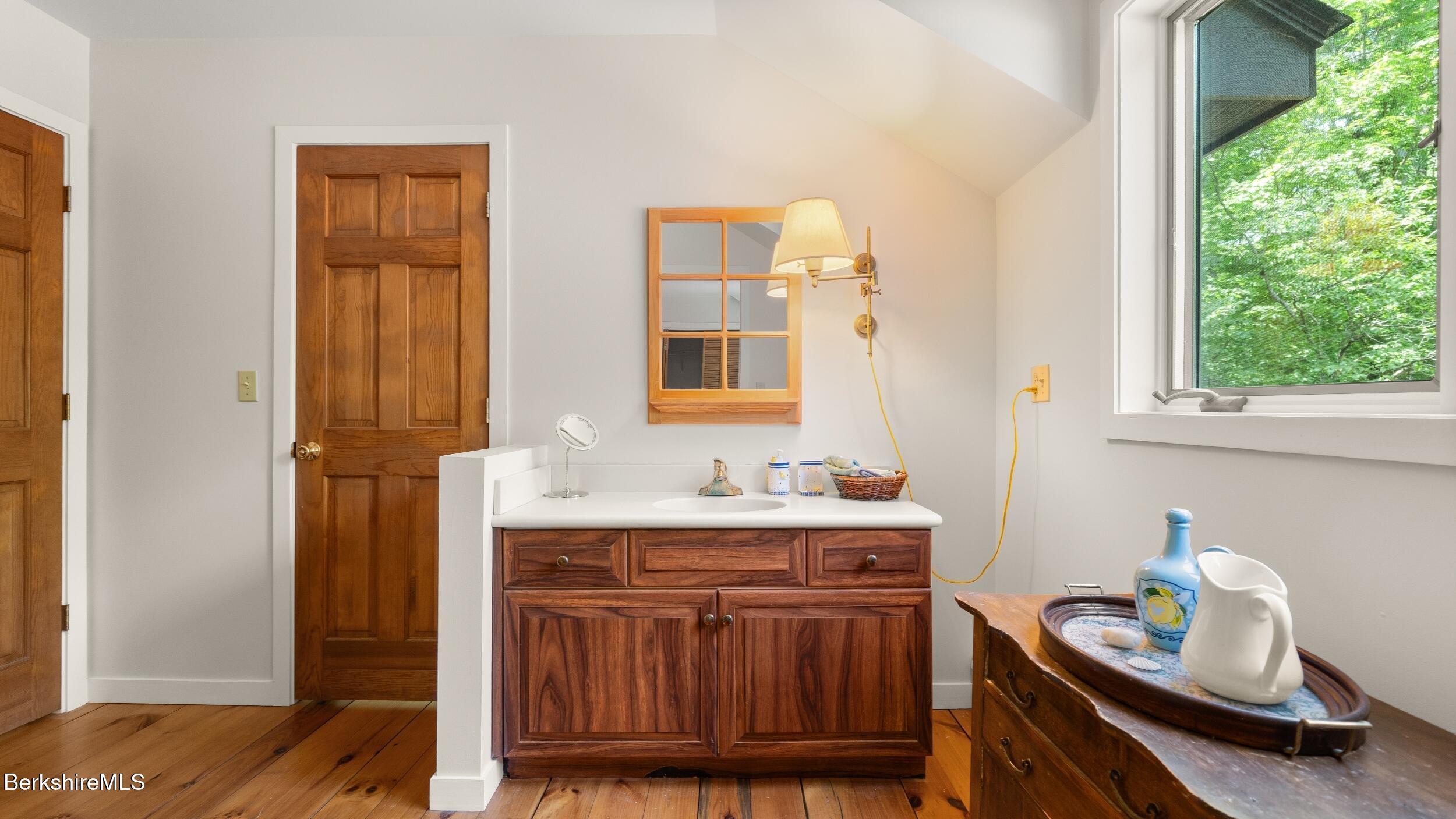 173 Hillsdale Road Egremont, MA 01230 - Photo 65 of 82 a bathroom with a sink a mirror and a window