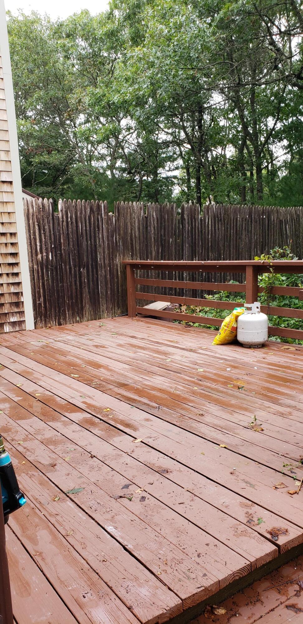 38 Round House Road, Unit 38 Bourne, MA 02532 - Photo 7 of 8 a view of a bench in a patio