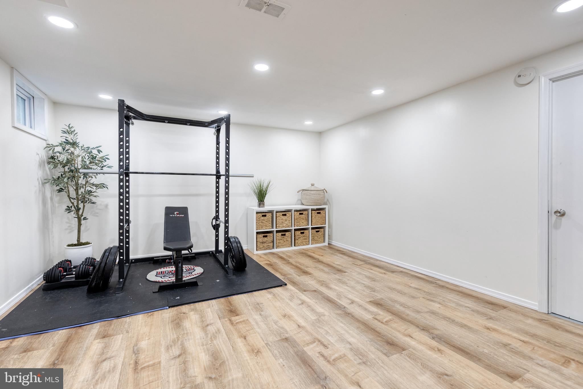 31 Regester Avenue Baltimore, MD 21212 - Photo 24 of 38 a view of a room with gym equipment and a large window