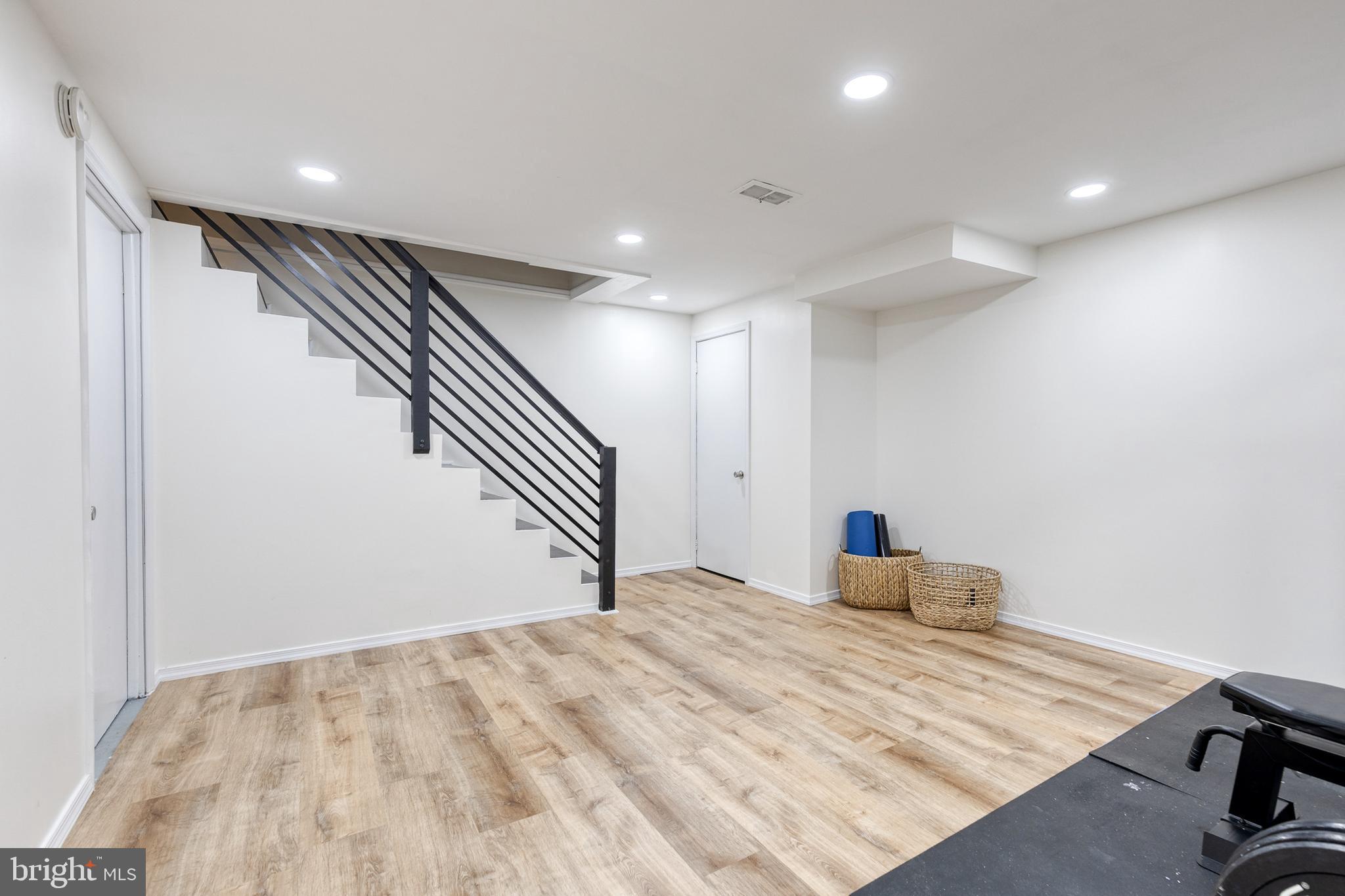 31 Regester Avenue Baltimore, MD 21212 - Photo 25 of 38 a view of empty room with wooden floor
