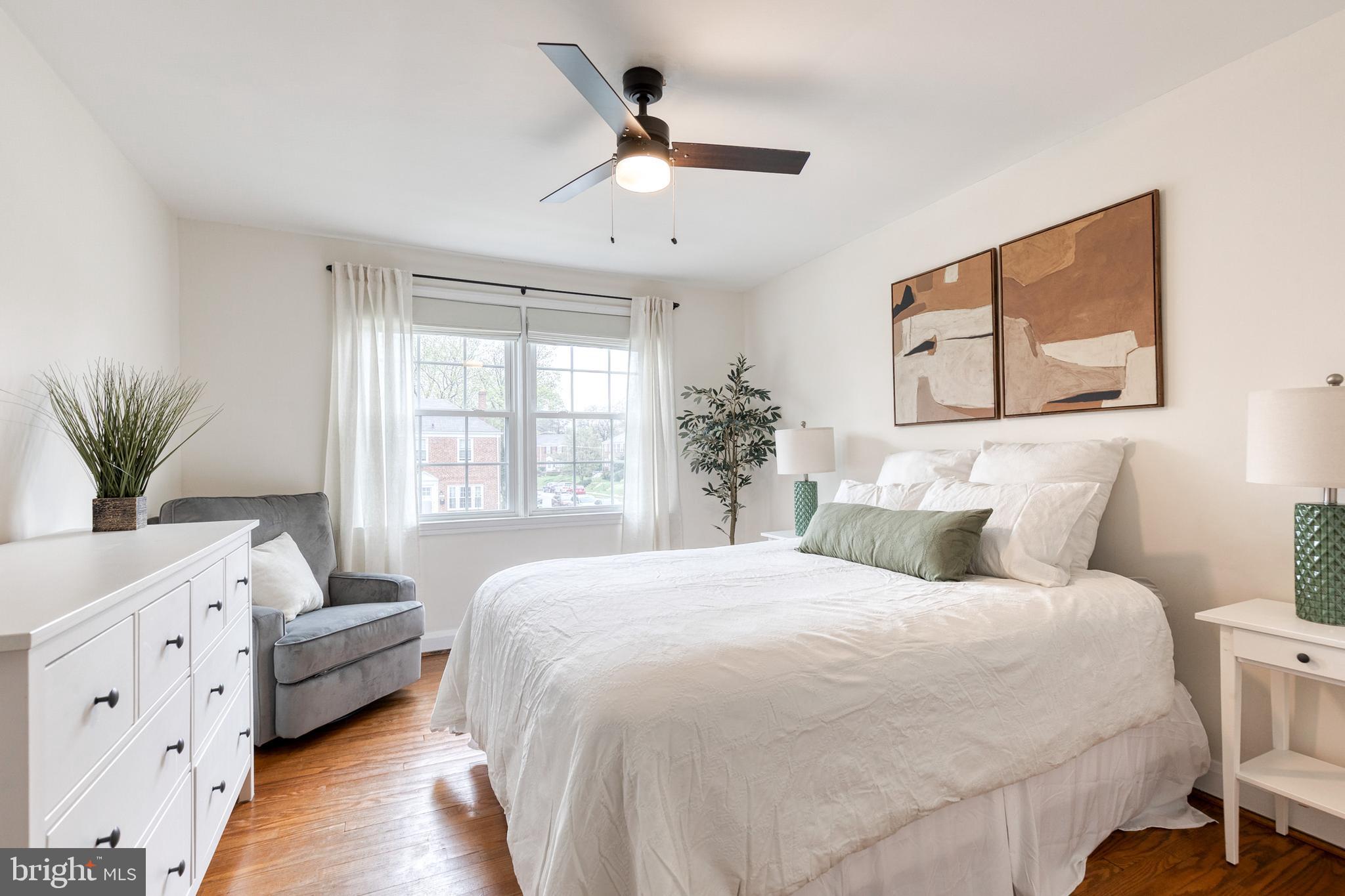 31 Regester Avenue Baltimore, MD 21212 - Photo 28 of 38 a bedroom with a large bed and a window