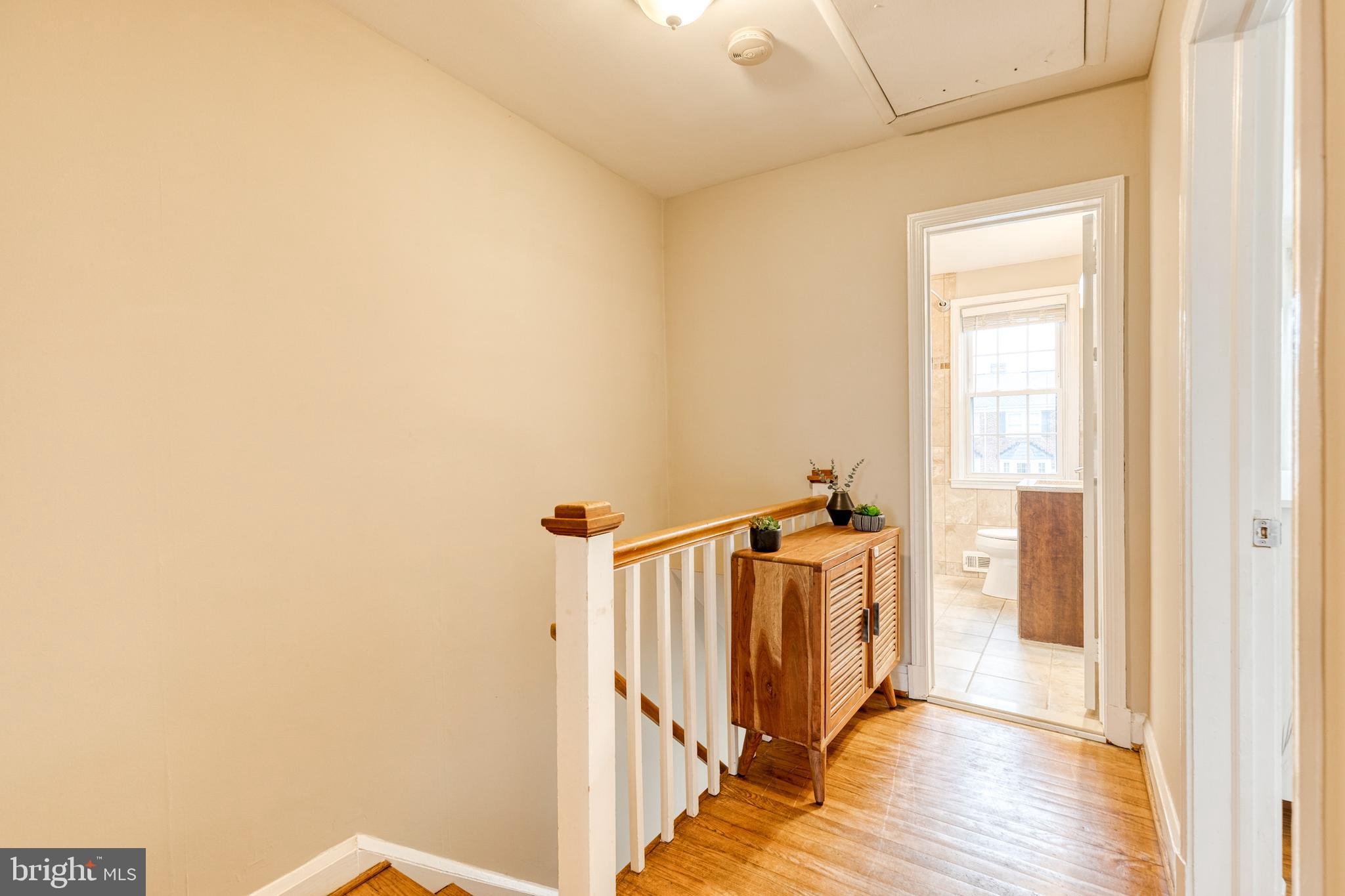 31 Regester Avenue Baltimore, MD 21212 - Photo 35 of 38 a view of a hallway with a white walls