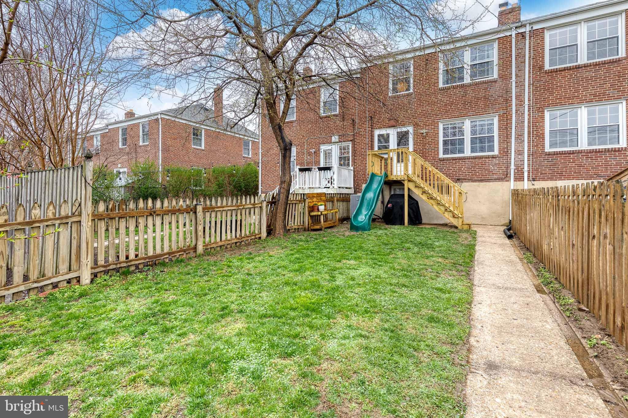 31 Regester Avenue Baltimore, MD 21212 - Photo 38 of 38 a view of a house with a yard in front of it