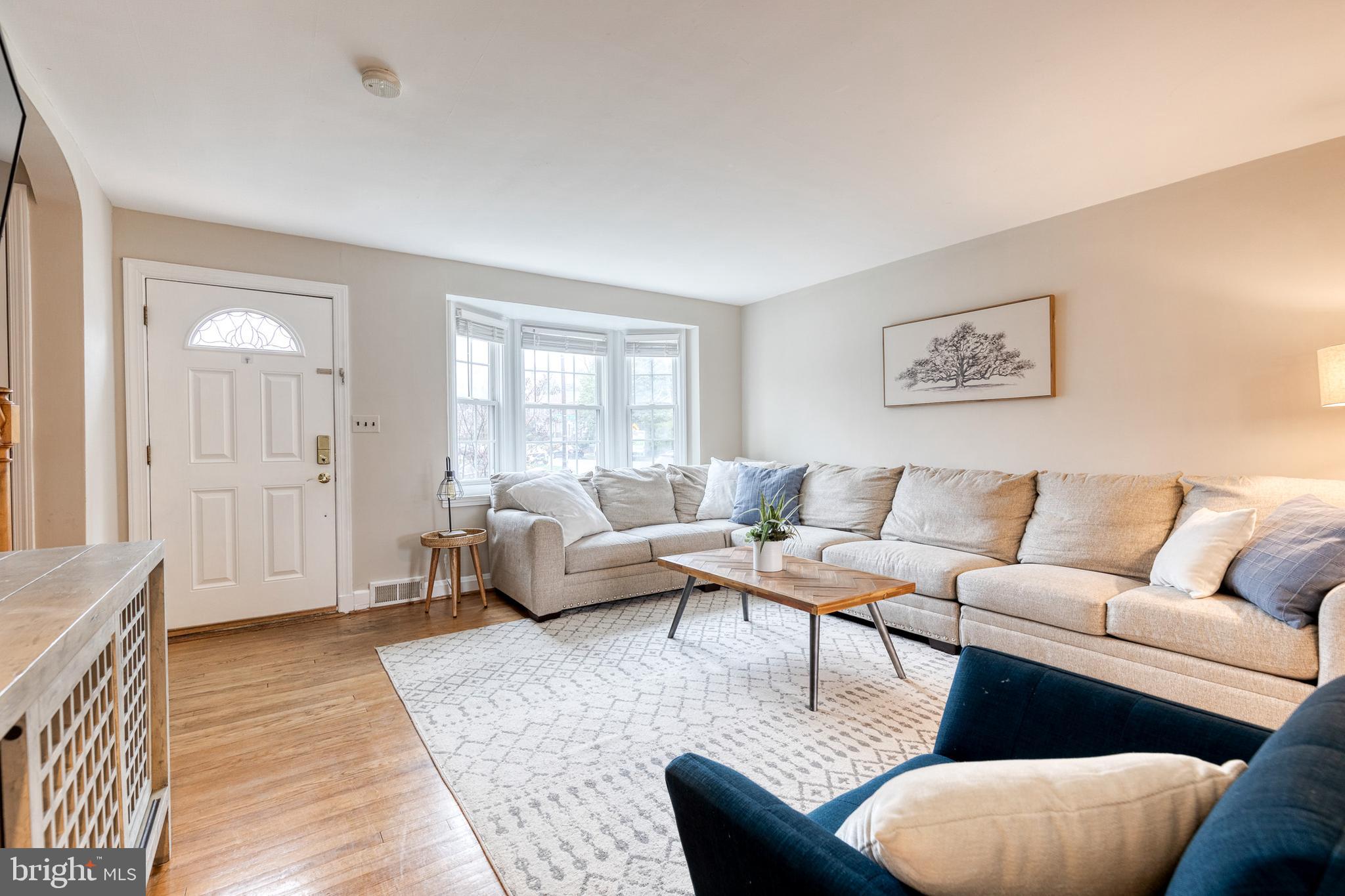 31 Regester Avenue Baltimore, MD 21212 - Photo 8 of 38 a living room with furniture and a couch