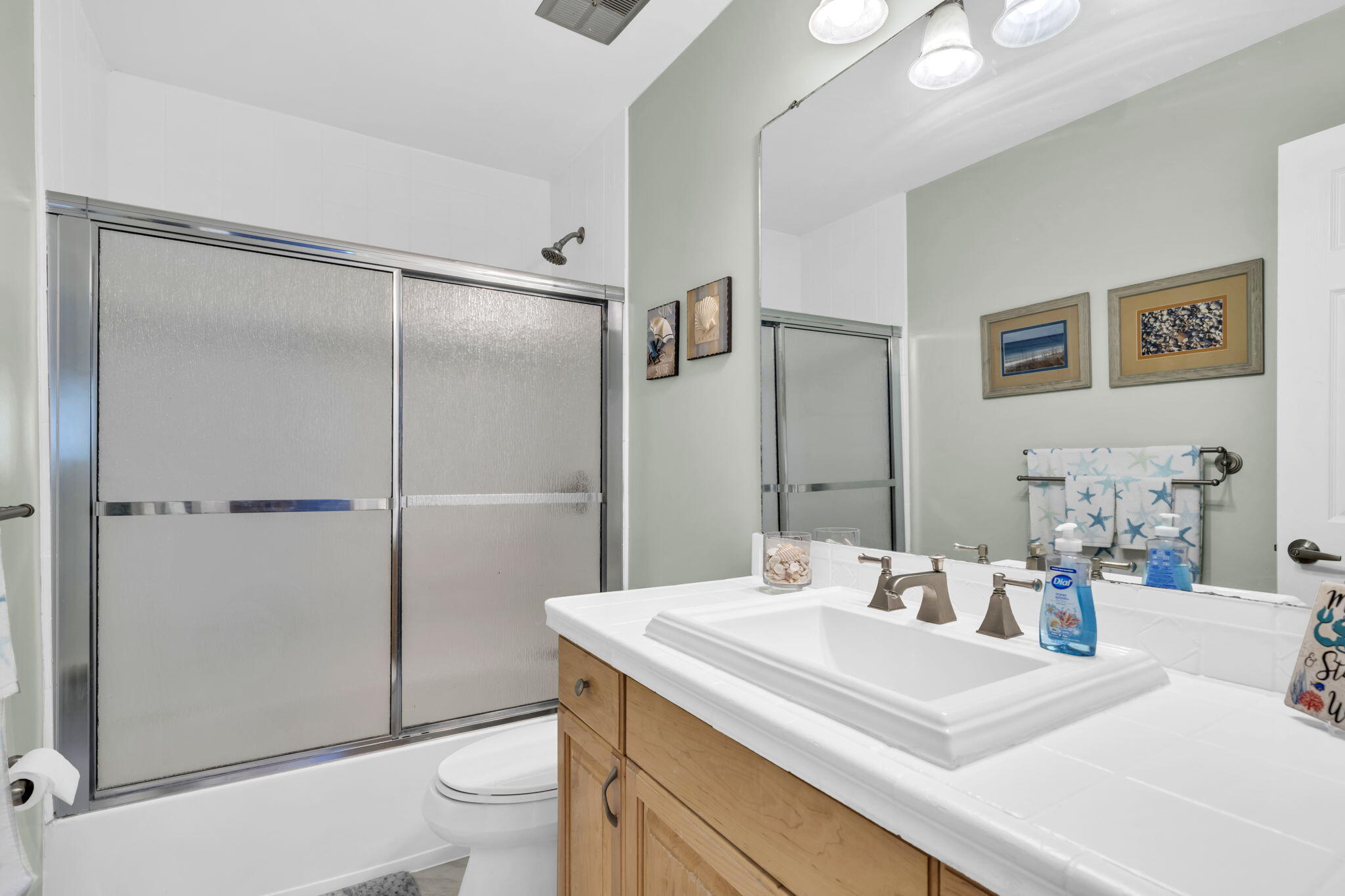 288 Ellis Road, Unit 114 Miramar Beach, FL 32550 - Photo 18 of 30 a bathroom with a sink toilet and shower