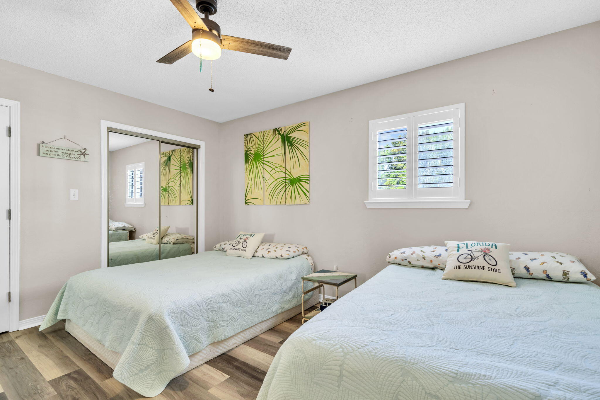288 Ellis Road, Unit 114 Miramar Beach, FL 32550 - Photo 21 of 30 a bedroom with two beds and a window
