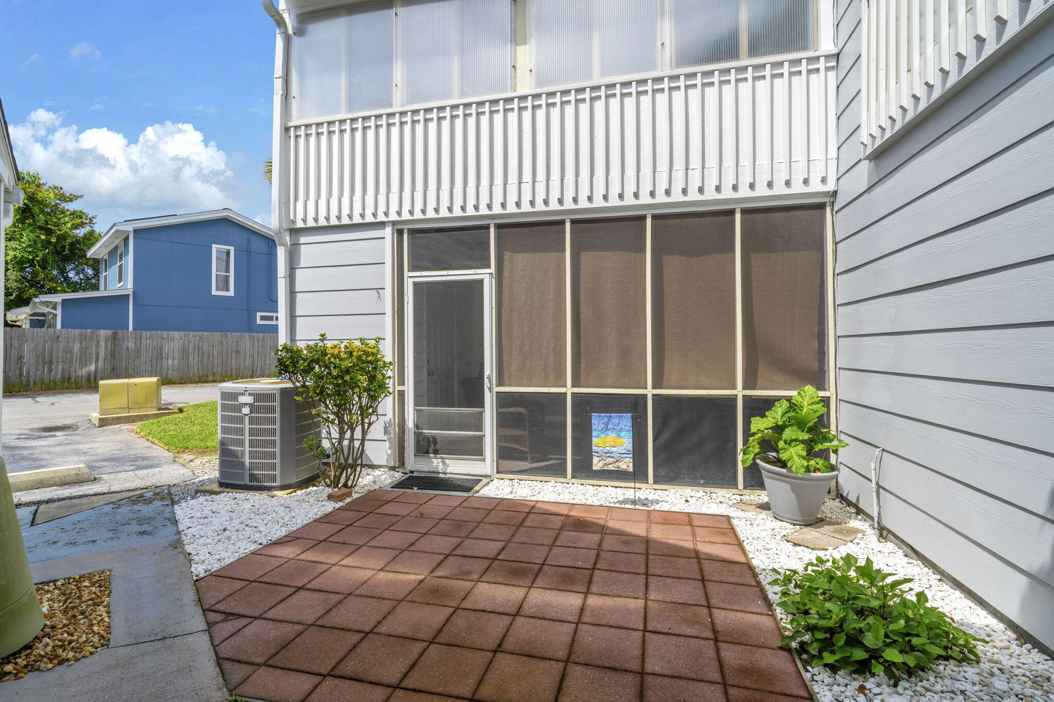 288 Ellis Road, Unit 114 Miramar Beach, FL 32550 - Photo 25 of 30 a view of a brick house with a large window