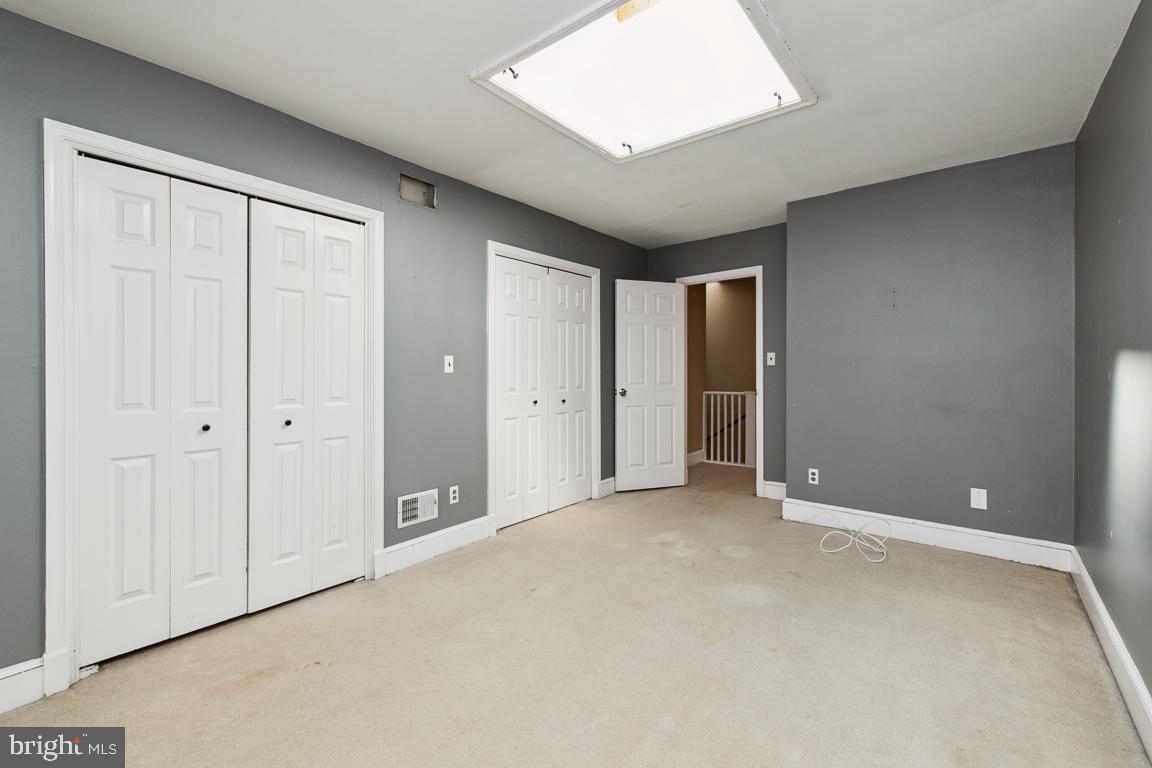 918 North Calvert Street, Unit D Baltimore, MD 21202 - Photo 20 of 35 Bedroom 1 with huge skylight