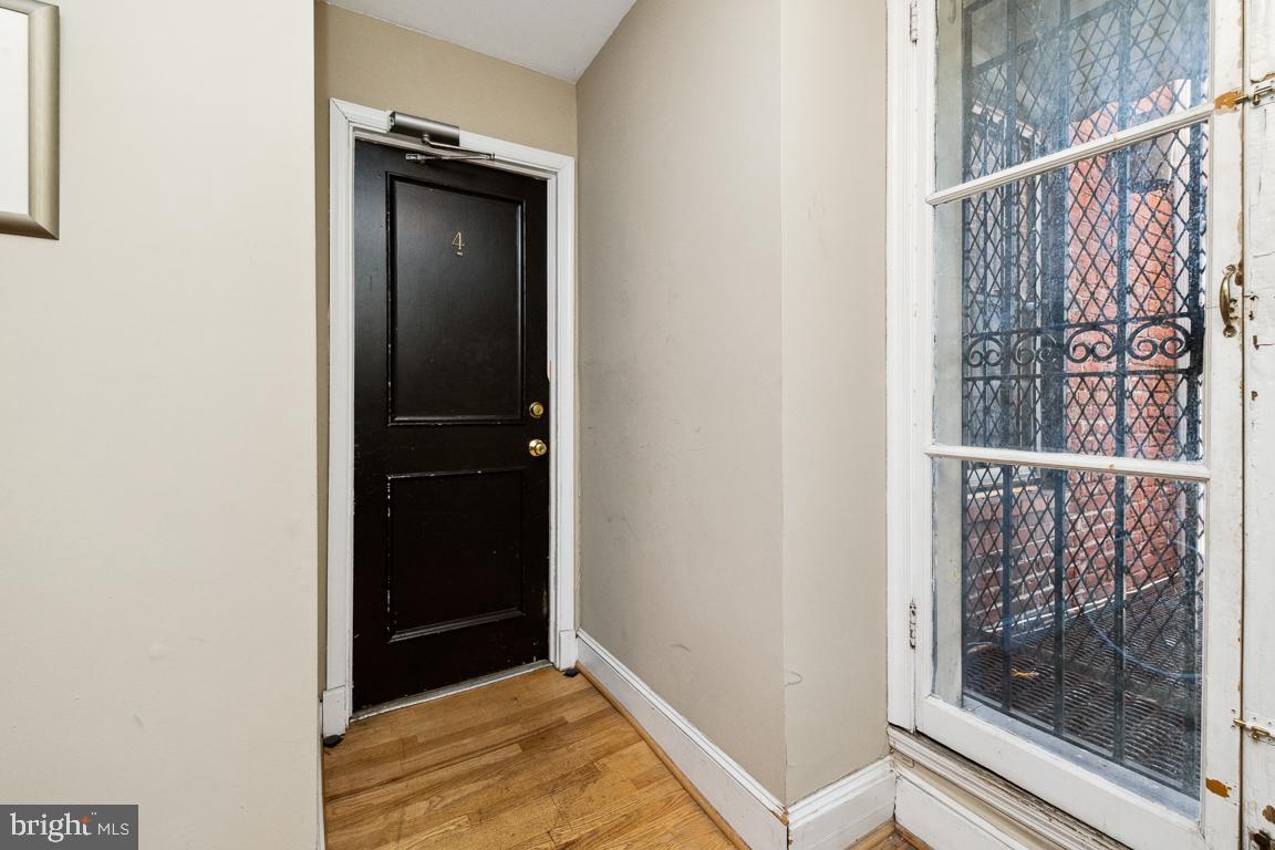 918 North Calvert Street, Unit D Baltimore, MD 21202 - Photo 4 of 35 Entry door on second floor.