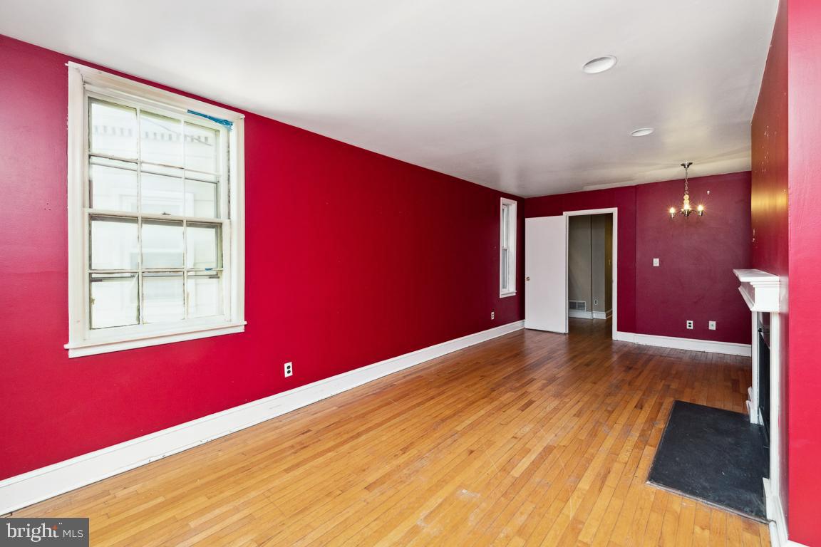 918 North Calvert Street, Unit D Baltimore, MD 21202 - Photo 8 of 35 Living Room with door to rear deck