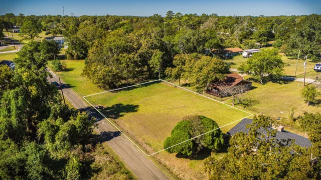a view of a swimming pool and an outdoor seating