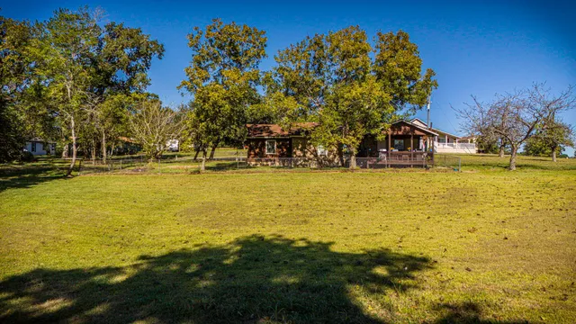 a view of a swimming pool with an outdoor space and seating area
