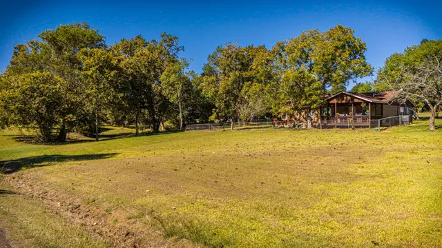 a view of swimming pool with an outdoor space and seating area