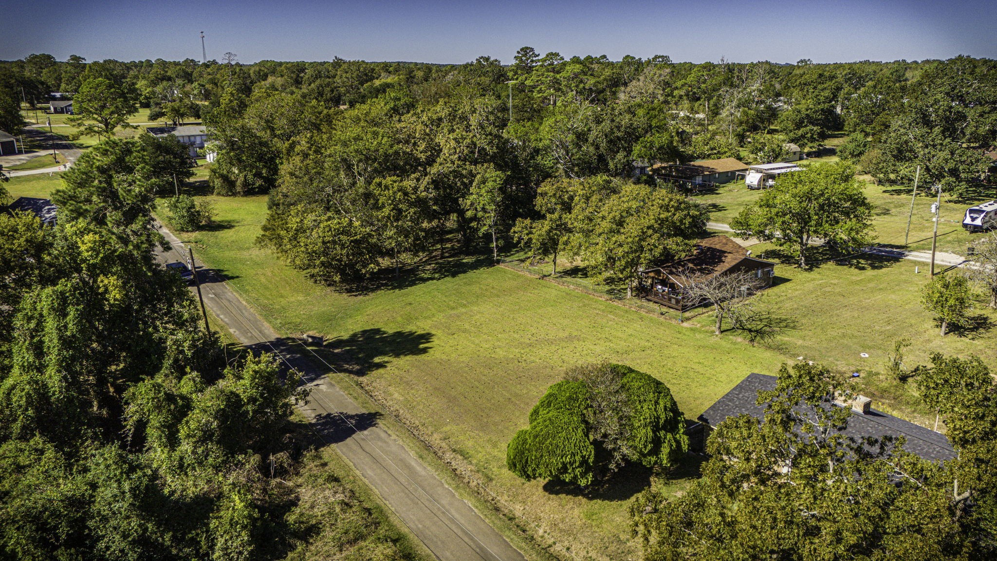 Tba Highcrest Drive Point Blank, TX 77364 - Photo 5 of 16 a view of a lake