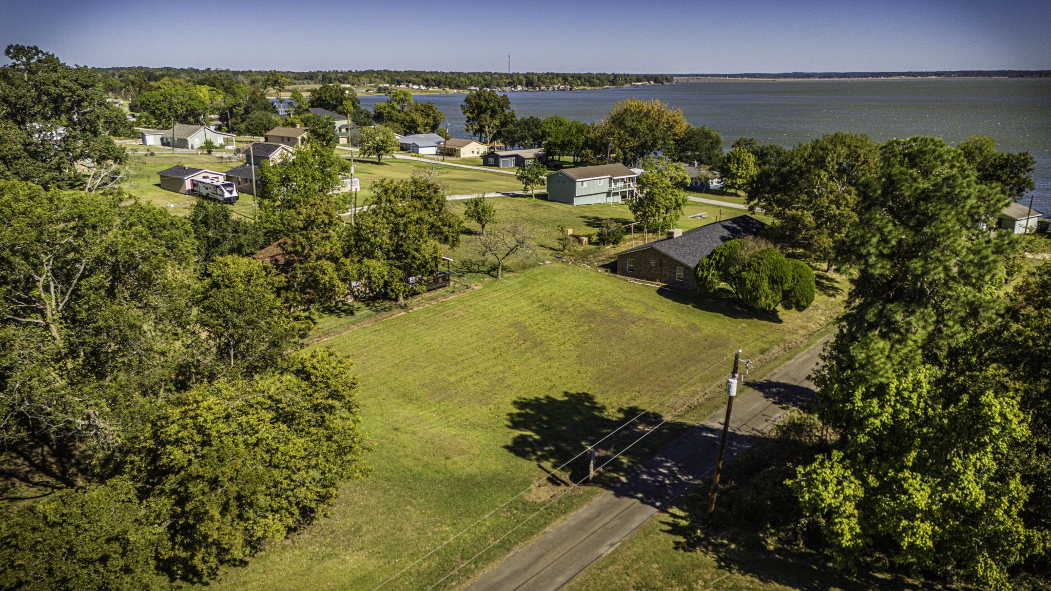 Tba Highcrest Drive Point Blank, TX 77364 - Photo 7 of 16 a view of a lake