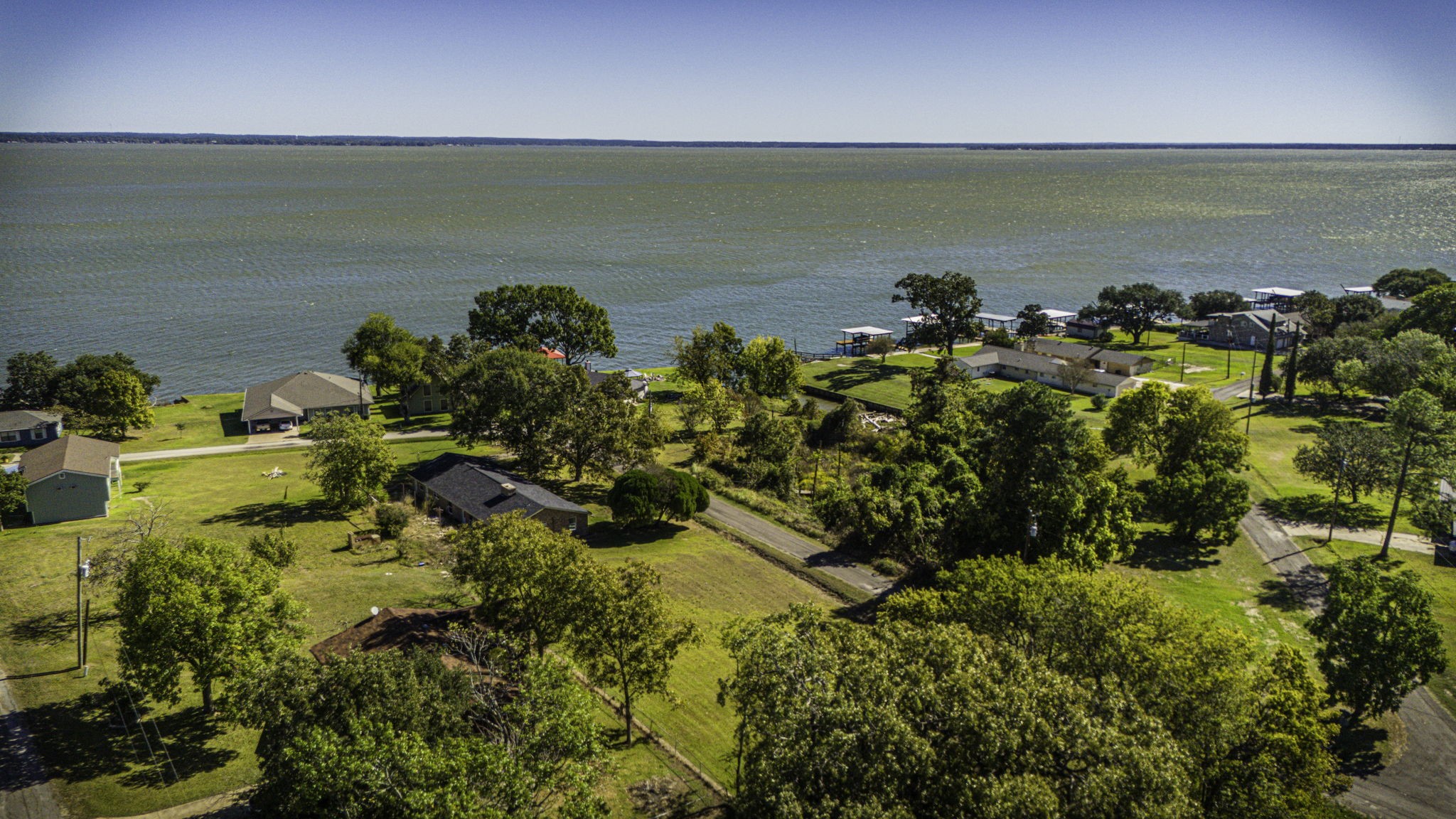 Tba Highcrest Drive Point Blank, TX 77364 - Photo 10 of 16 a picture of a lake view