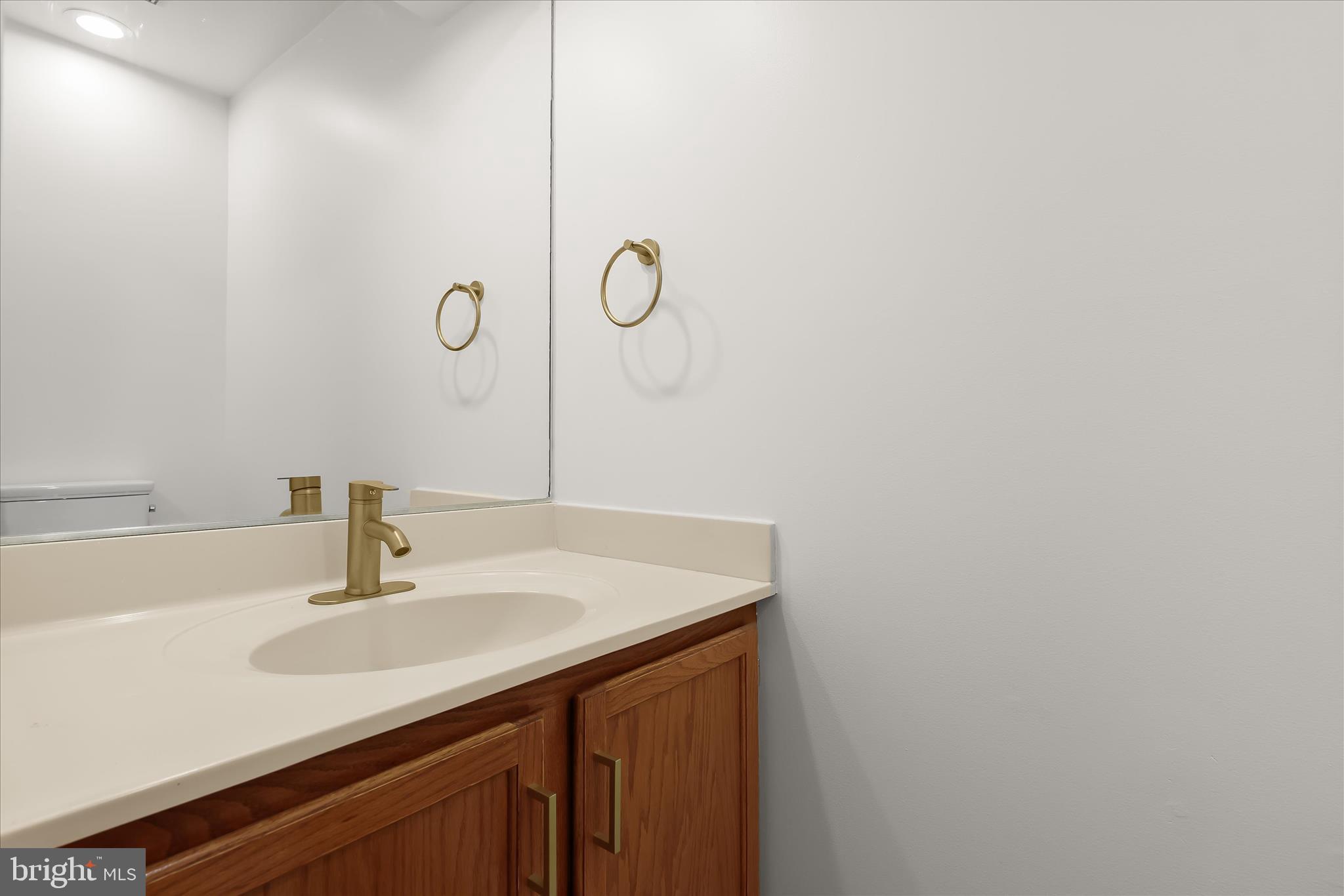 508 Greencrest Lane Odenton, MD 21113 - Photo 24 of 46 a bathroom with a sink and a mirror