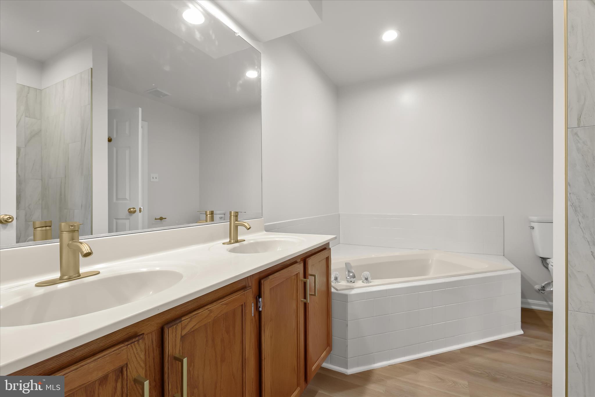 508 Greencrest Lane Odenton, MD 21113 - Photo 26 of 46 a bathroom with a bathtub and a sink