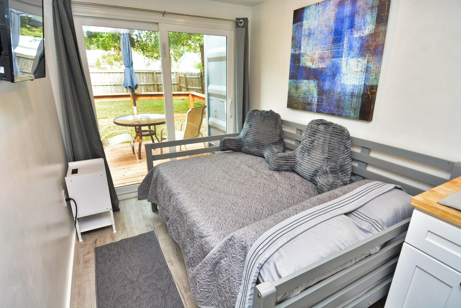 Tbd Southeast Iris Street Stuart, FL 34997 - Photo 13 of 33 a bedroom with a bed and a large window