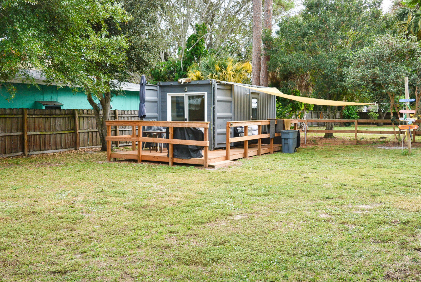 Tbd Southeast Iris Street Stuart, FL 34997 - Photo 20 of 33 a view of a house with backyard porch and sitting area